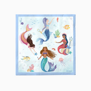 Masă aniversară cu tematică sirene, decor pastelat și șervețele cu ilustrații marine
